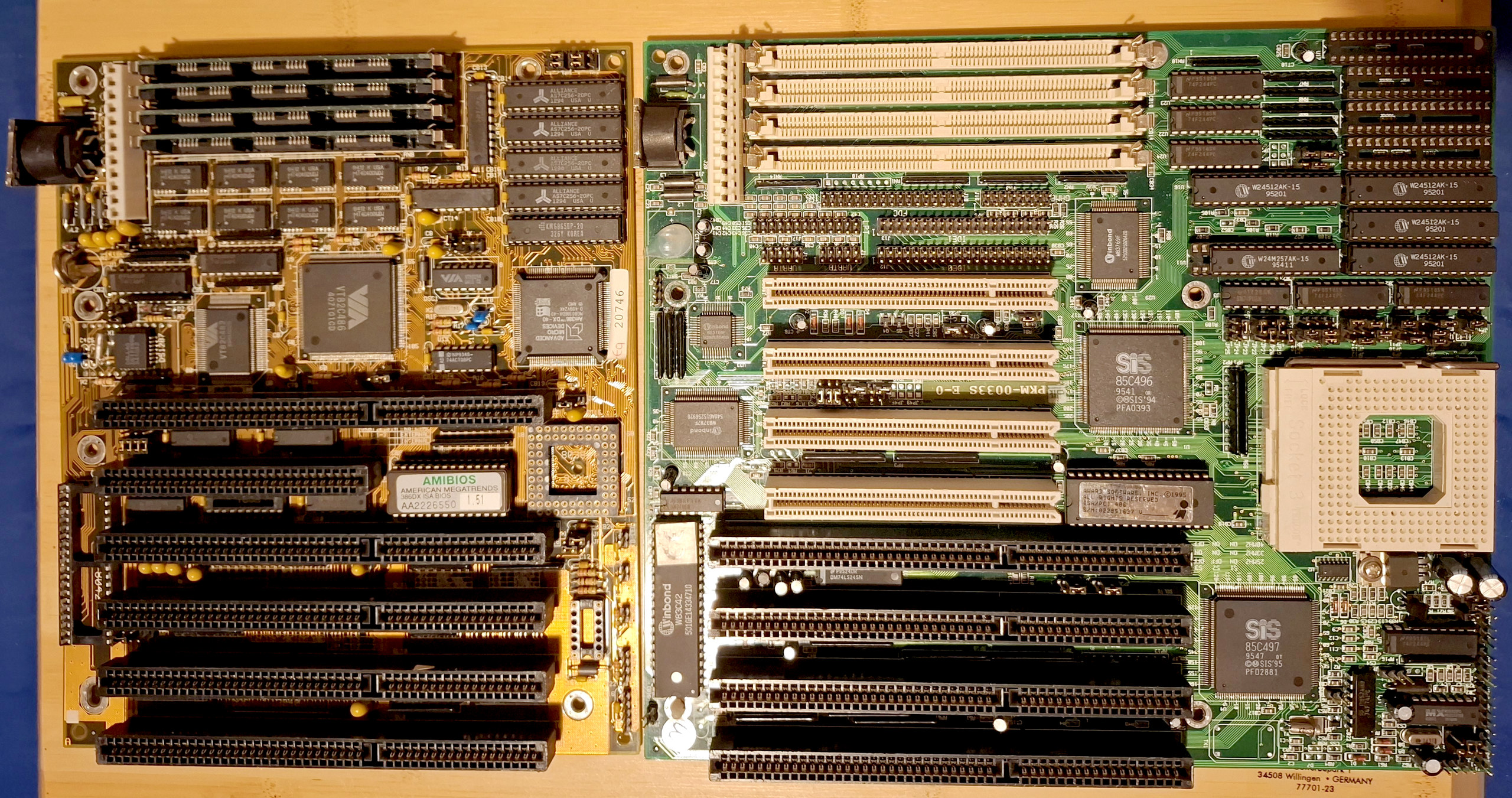 Historical Baby AT boards for 386 and 486 processors. You can see the now-obsoleted ISA and PCI slot types, as well as SIMM slots for memory. L2 Cache (on board and not in the CPU) was still composed of separate SRAM chips, which were replaceable